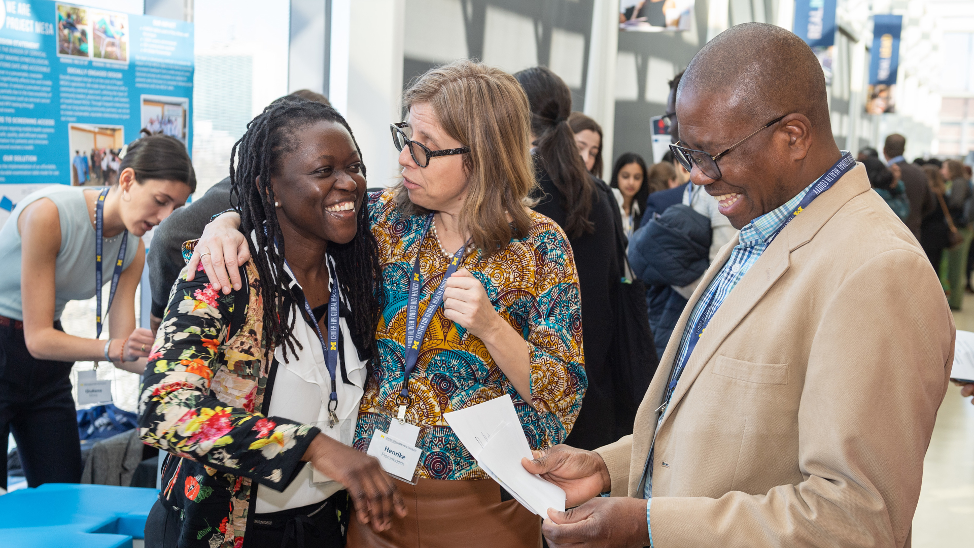 Center members reconnecting and discussing their research, University of Michigan