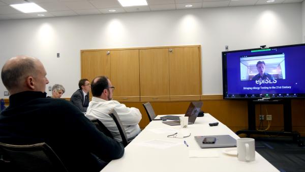 U-M faculty member presents his project to the evaluation committee during the 2023 competition. 