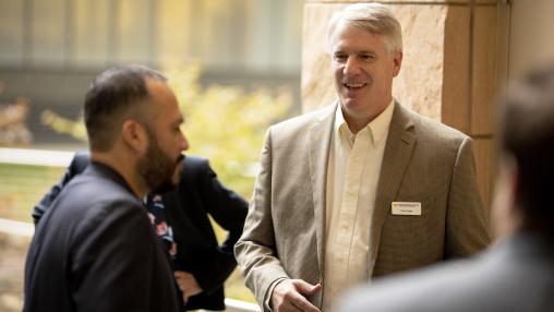 Paul Clyde at the Ross School of Business engaging with conference attendees